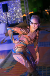 Entertainers dressed in hand painted flying monkey costumes intereacted with guests at this Wizard of Oz themed fundraiser.