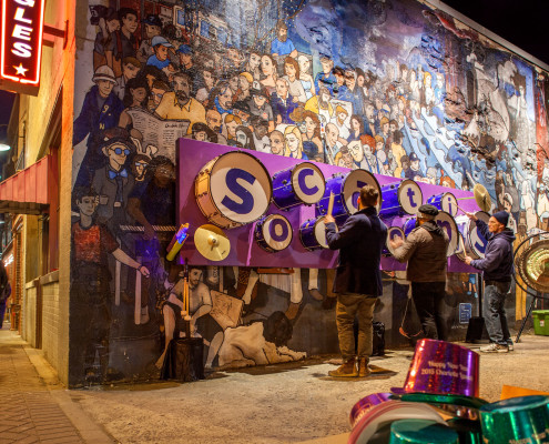 A custom drum wall was created in an eclectic neighborhood of Charlotte encouraging people to find their rhythm. A professional drummer was close by to give a quick lesson.